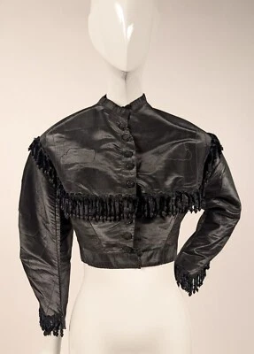 CHAQUETA MÁS SEDA NEGRA REGADA GUERRA CIVIL AÑOS 1860 CON RIBETE DE FLECOS DE GUSANO DE CHENILLA DE SEDA Foto 1 de 4