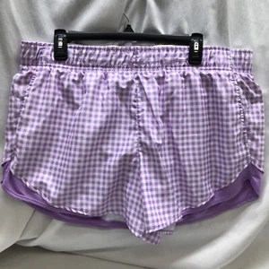 ATHLETIC WORKS PANTALONES CORTOS DE RUNNING CON NÚCLEO ABSORBENTE DE HUMEDAD PARA MUJER XL (16-18) PÚRPURA A CUADROS - Imagen 1 de 22