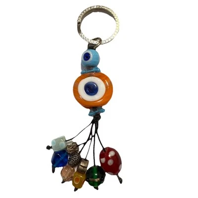 Llavero de cerámica hecho a mano Evil Eye Bag Charm ¡NUEVO! Cartera con cuentas de vidrio plateado de colección Foto 1 de 4