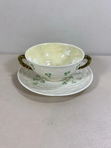 Belleek Cream Soup Cup and Saucer with Shamrocks and Basketweave Design - Picture 1 of 7