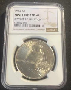 1934 P  Peace Silver Dollar NGC MS-63 - Mint Error Reverse Lamination beautiful - Picture 1 of 2