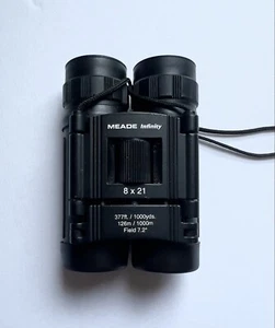 Meade Infinity Binoculars - 377ft / 1000 yds - Field 7.2 - Sight Seeing - 8X21 - Picture 1 of 7