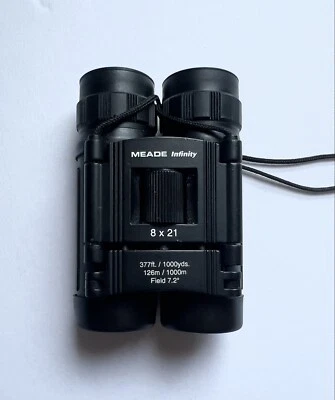 Meade Infinity Binoculars - 377ft / 1000 yds - Field 7.2 - Sight Seeing - 8X21 - Image 1 of 4