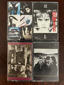 U2 VINTAGE CASSETTE LOT OF 4 Joshua Tree WAR The Unforgettable Fire Achtung Baby - Picture 1 of 2