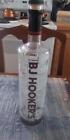 LOVELY "BJ HOOKER'S" HOUSTON TX EMPTY GLASS VODKA BOTTLE EMBOSSED GLASS DESIGN