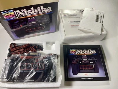 Cámara 3D Nishika N8000 35 mm caja abierta utiliza película a color estándar - no necesita gafas Foto 1 de 4