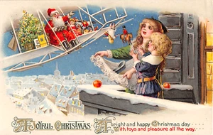 c.1910 Santa in Airplane Dropping Toys to Children Christmas post card - Picture 1 of 2