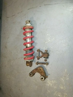 1982 1983 82 83 Honda XL250R XL 250 R OEM Amortiguador trasero suspensión enlace de resorte Foto 1 de 4
