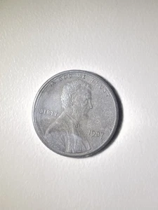 1987 Penny Unplated Planchet. coin that is lacking the copper layer or zinc  - Picture 1 of 6