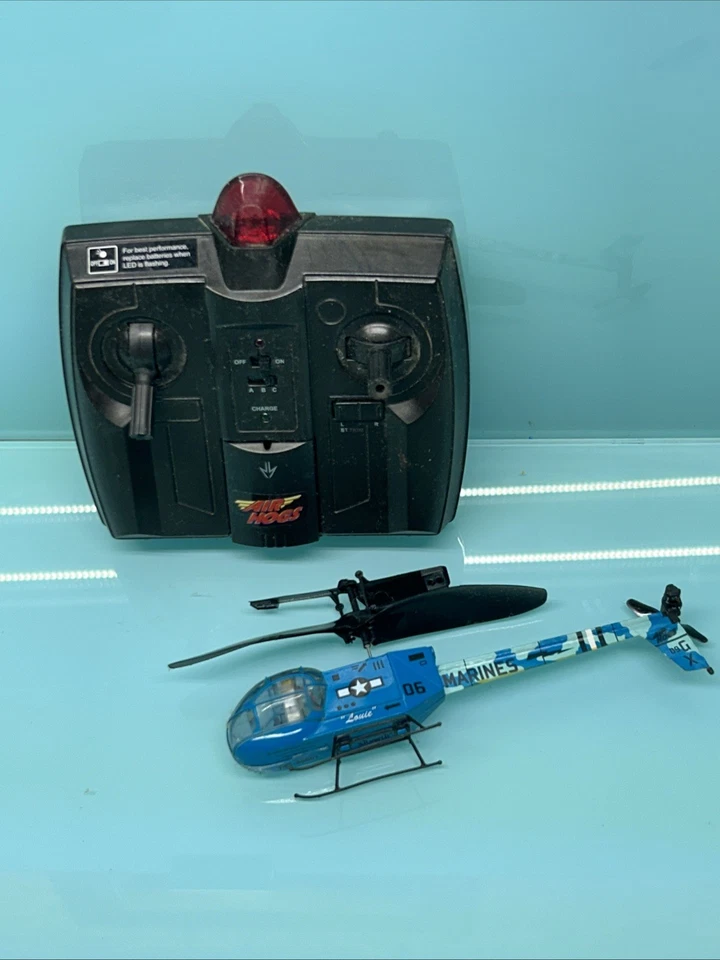 ￼ Air Hogs US Military Marines 2C Helicopter RC Remote Sold As  Parts Or Repairs - Image 1 of 4