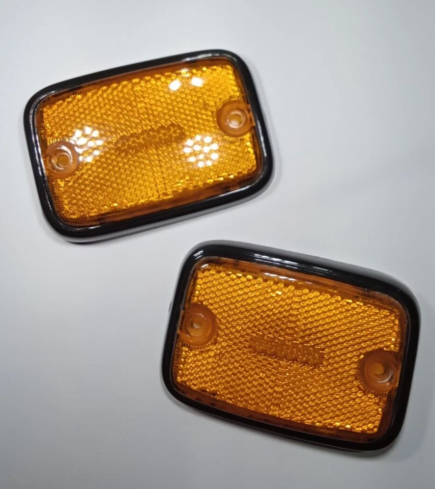 JUEGO DE LENTES MARCADORES LATERALES DELANTEROS IZQUIERDO DERECHO ÁMBAR NEGRO MOLDURA VOLKSWAGEN T2 BUS 1976-79 Foto 1 de 4