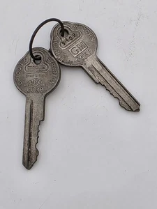 Vintage Pair Of GM BASCO Briggs & Stratton Corp KnockOut Keys #9409 - Picture 1 of 6