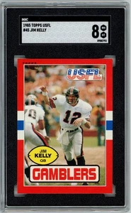 1985 Topps USFL JIM KELLY #45 GIOCATORI D'AZZARDO raro RC SGC 8 NM-MT N821 - Foto 1 di 3