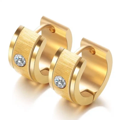 Pendientes de aro Huggie de oro de una piedra de circonita cúbica ancha unisex de acero inoxidable Foto 1 de 4