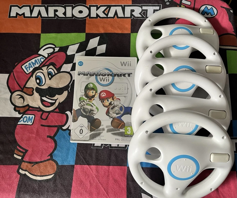 Mario Kart Wii - Nintendo Wii With 4 Official Steering Wheels - Image 1 of 1
