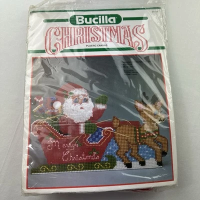 Bucilla Dashing Thru the Snow Door Stop Plastic Canvas Kit #61114 Sealed Santa - Image 1 of 4