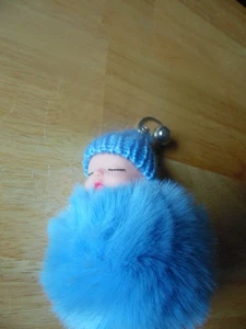 Schlüsselanhänger  Puschel mit Schlüsselring + Glöckchen in hellblau - Bild 1 von 4