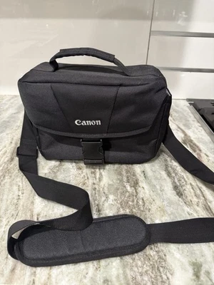 Black Canon Camera 100ES Shoulder Bag Camera Storage, Lens Storage - Image 1 of 4
