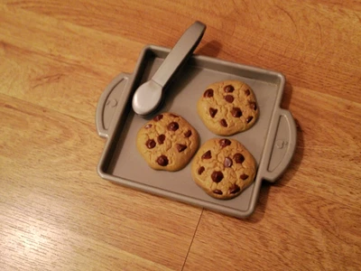 Pinzas para hoja de galletas galletas chispas de chocolate diversión con comida vintage FISHER PRICE Foto 1 de 4