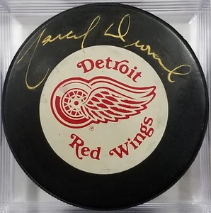 MARCEL DIONNE Autographed Detroit Red Wings NHL Hockey GAME PUCK Signed - Picture 1 of 3
