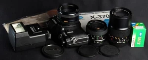 Minolta X-370s Black 35mm Film SLR + 50/1.7, 28/2.8 & 135/3.5 Lens & Flash Kit - Picture 1 of 12