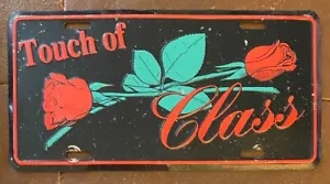 Placa de licencia Touch of Class Rose Booster de 1990 - Imagen 1 de 1