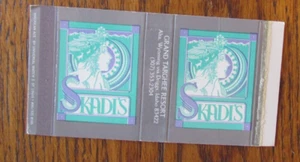 DRIGGS,IDAHO MATCHBOX COVER: SKADI'S VUOTA GIRLIE MATCHCOVER -C - Foto 1 di 1