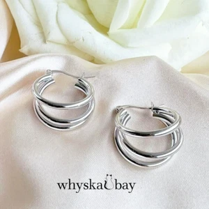 Pendientes de aro Whyskabay de línea curva simple - oro blanco de 18 quilates y plata de ley - Imagen 1 de 4