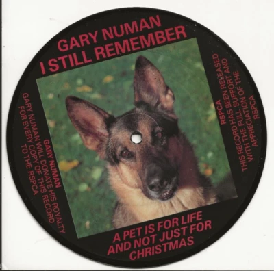 GARY NUMAN I STILL REMEMBER/PUPPETS UK RSPCA CHARITY PICTURE DISC, MINT - Image 1 of 2
