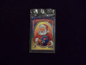 FOOTBALL UNOPENED 11 CARD SANTA CLAUS SET JIM KELLY - Picture 1 of 2