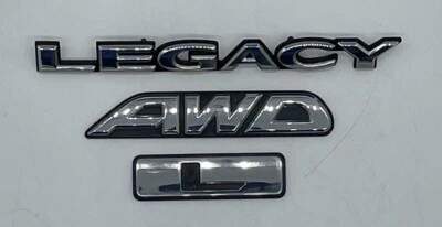 2001 - 2004 SUBARU LEGACY L AWD CHROME REAR TRUNK EMBLEM BADGE LOGO NAMEPLATE - Image 1 of 4