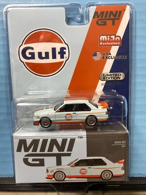 1/64 MINI GT MIJO EXCLUSIVES GULF RACING BMW M3 BLUE AND ORANGE - Image 1 of 2