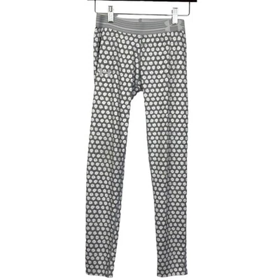Leggings de compresión Under Armour Youth grises blancos a lunares talla YXS Foto 1 de 4
