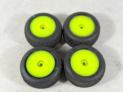 Losi Mini-T 1/18 JCONCEPTS Ellipse Tires Front Rear Mounted Yellow Wheels - Image 1 of 4