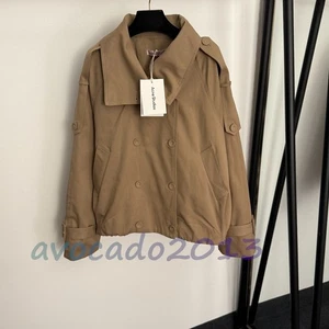 Chaqueta cortavientos ACNE para mujer caqui de doble botonadura solapa manga larga - Imagen 1 de 10