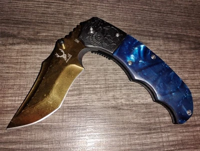 Bone Edge Gold & Blue Pearlescent Skull Liner Lock Folding Pocket Knife Steel - Image 1 of 4