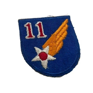 Parche Inv# K0845 de la Segunda Guerra Mundial Ejército de los Estados Unidos 11ª Fuerza Aérea - Imagen 1 de 2