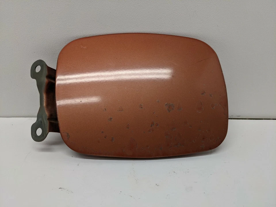 95 96 97 98 99 MITSUBISHI EAGLE TALON FUEL DOOR ORANGE Foto 1 de 2