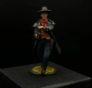Vaquero de hojalata coleccionable con impermeable - Imagen 1 de 4