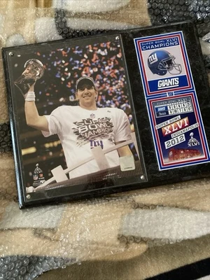 Foto enmarcada 8x10 Gigantes Eli Manning Super Bowl 2012 placa trofeo MVP SB campeón Foto 1 de 2