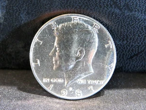 1987 P Uncirculated Kennedy Half Dollar - Picture 1 of 10
