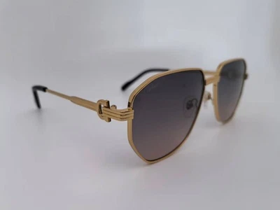 Gafas de sol Cartier con montura dorada unisex grises lentes degradadas Foto 1 de 4