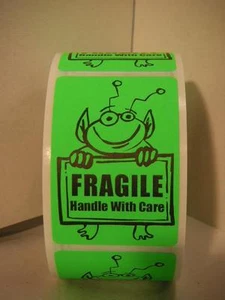 FRAGILE HANDLE WITH CARE Cute Green Alien Holding Sign 2x3 Sticker Label 250rl - Picture 1 of 1