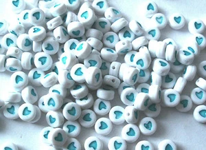 100pcs turquoise blue and white pill shaped heart beads acrylic 7mm - Picture 1 of 1