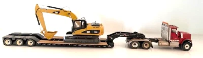 1:50 Diecast Masters HX520 Semi w/Lowboy Caterpillar 320DL Excavator #85613 - Image 1 of 4