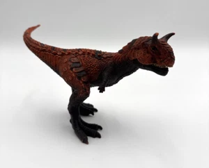 Statuina giocattolo dinosauro Schleich Carnotaurus mascella articolata - Foto 1 di 8