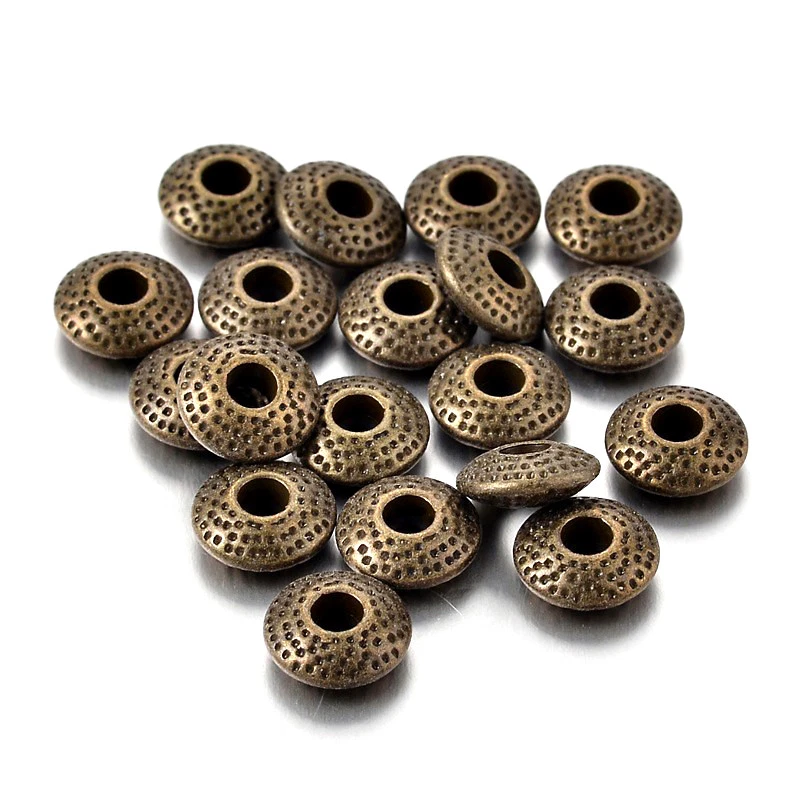 100pcs Bumpy Tibetan Alloy Donut Metal Beads Antique Bronze Loose Spacers 8x3mm - Image 1 of 2
