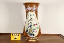 A Chinese cafe au lait batavia style ground famille rose trumpet vase 19th/20thc