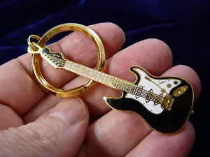 (M-221-C) Chitarra elettrica PORTACHIAVI GIOIELLO uno dei 4 colori - Foto 1 di 3