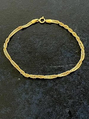 Sweet 14k Yellow Gold 7.5” Twisted Style Bracelet-3.3mm- 1.55 Grams-Read Discrip - Image 1 of 4
